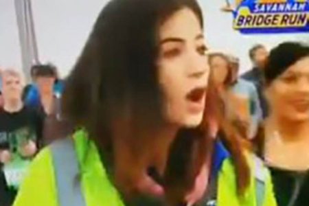 Alex Bozarjian reacts after being groped by a jogger on live television.