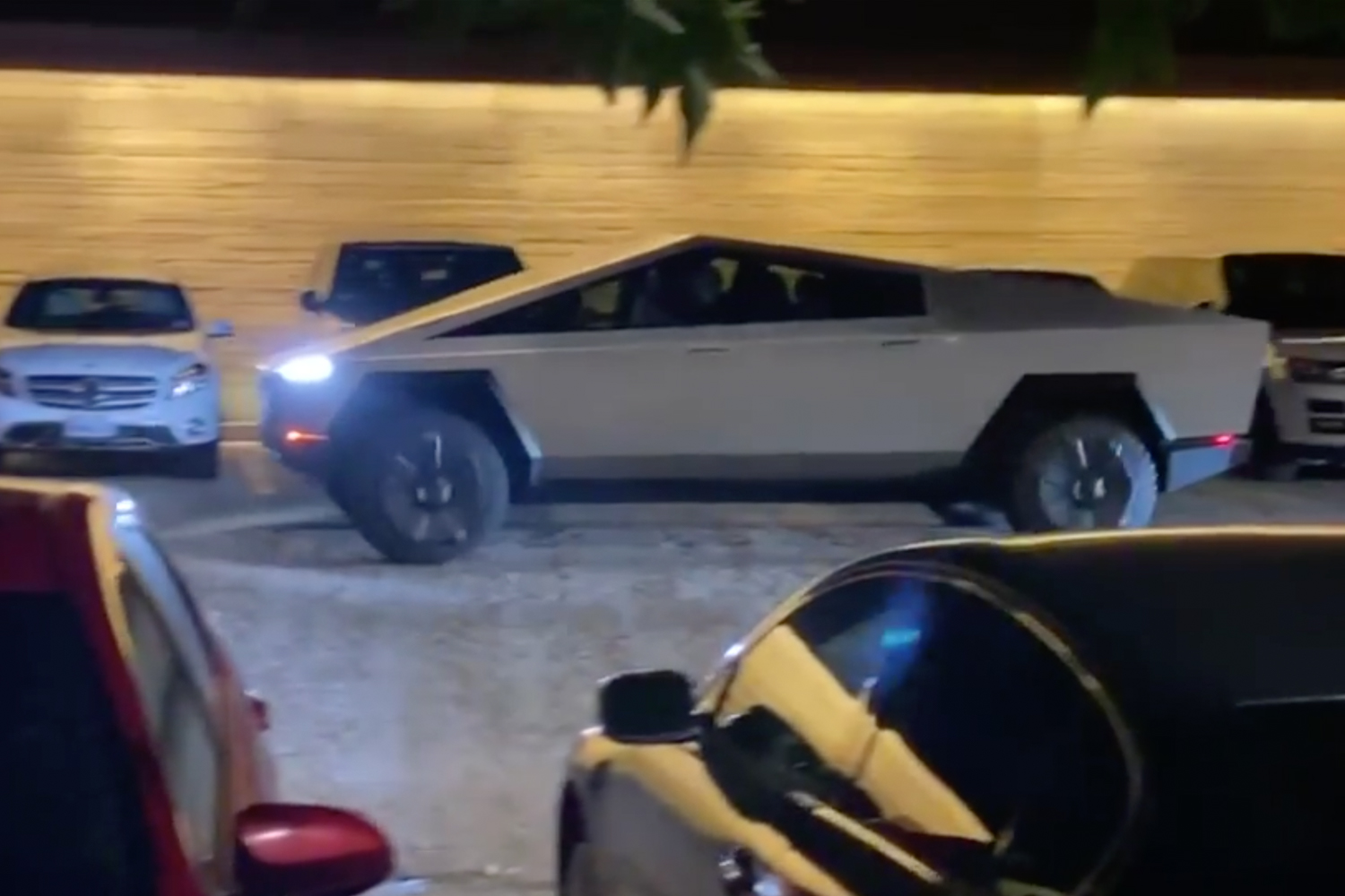 Elon Musk Drives Cybertruck to Dinner, Steamrolls Traffic Pylon on the Way Out