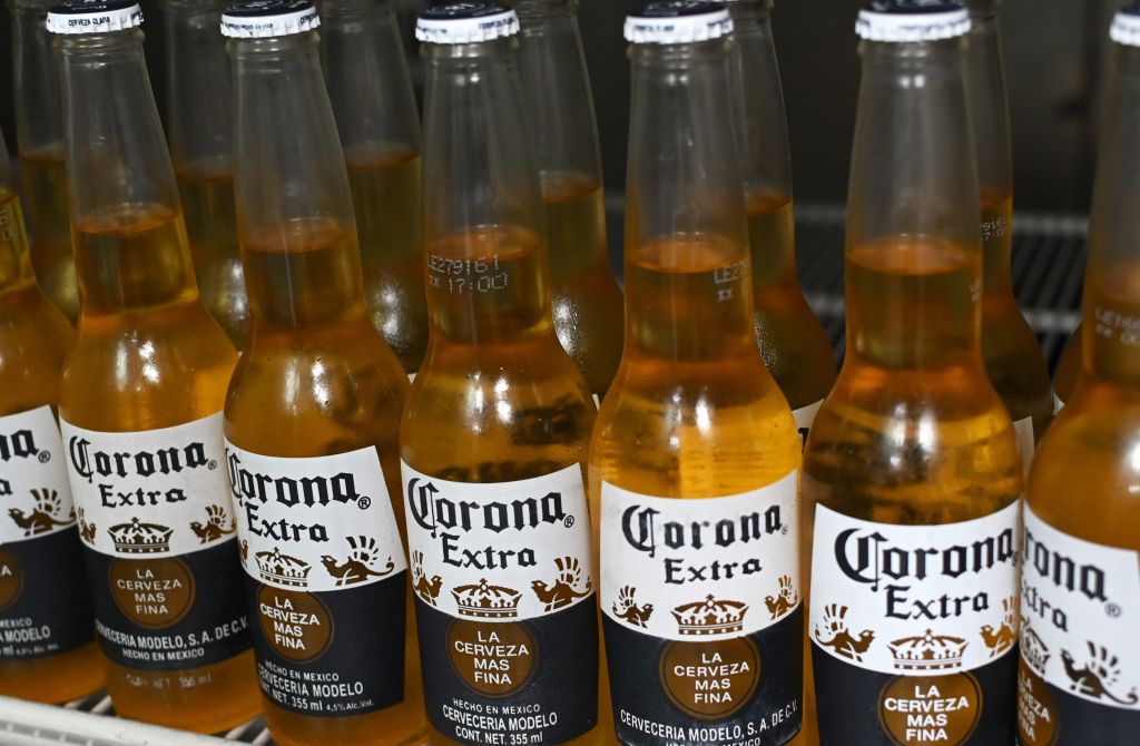 Picture of bottles of Mexican beer Corona, taken in Mexico City on June 4, 2019. (Photo by Rodrigo ARANGUA / AFP)        
