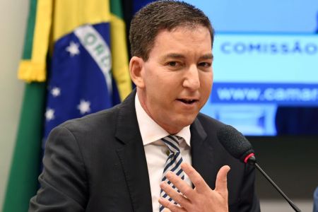 US journalist Glenn Greenwald, founder and editor of The Intercept website gestures during a hearing at the Lower House's Human Rights Commission in Brasilia, Brazil, on June 25, 2019.  (Photo by EVARISTO SA / AFP)