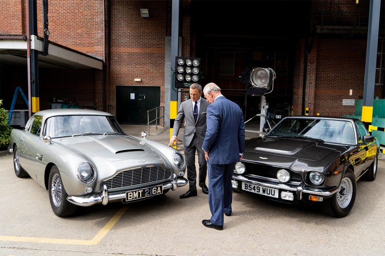 Aston Martin DB5 and V8 with James Bond's Daniel Craig and Prince Charles