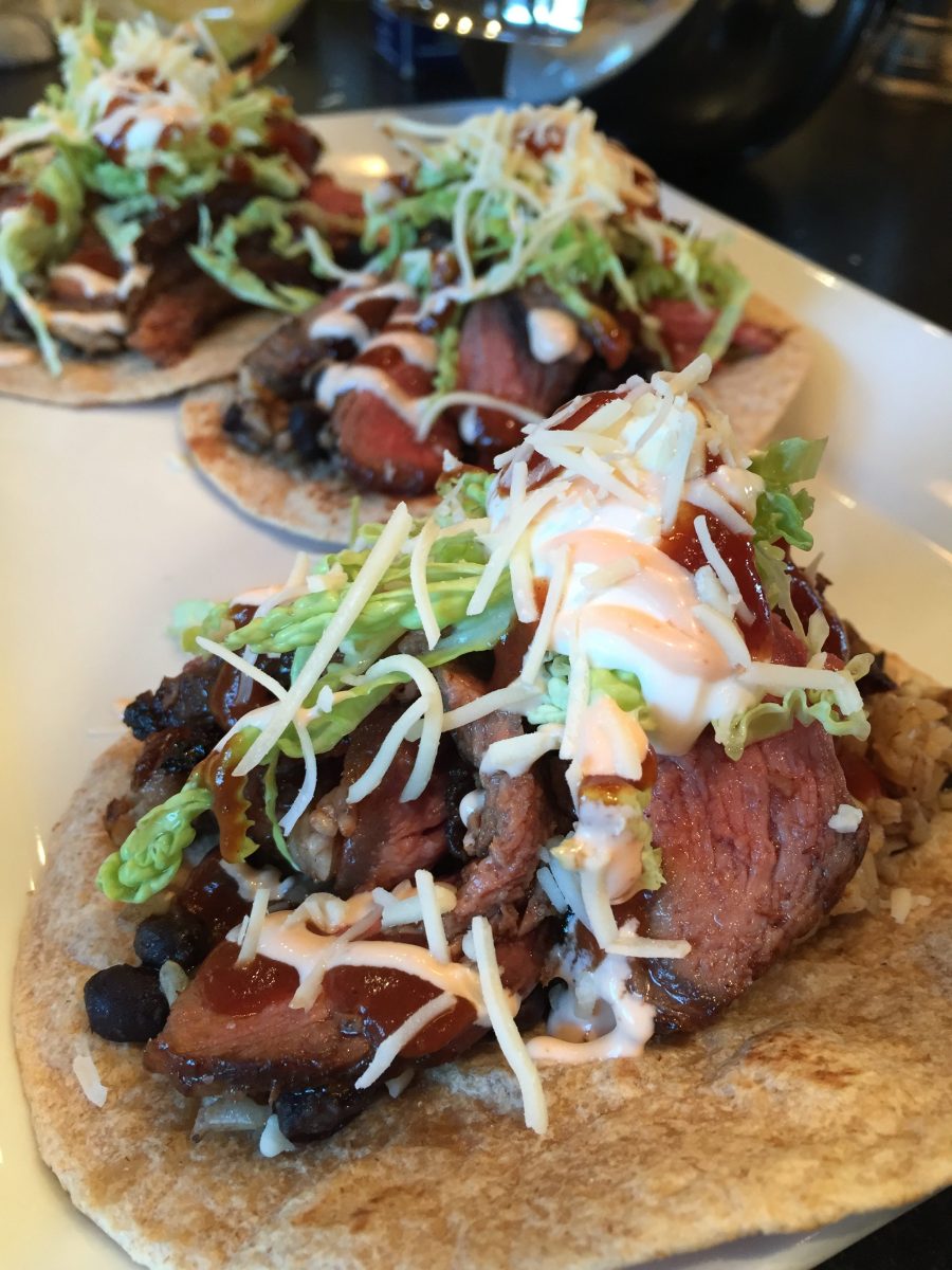 <strong>Coffee-Roasted Bison Ribeye Tacos</strong><br>“We're talking about another kind of taco here. Bison is a leaner meat, which makes it healthier,” <br>Ingraham says. “But not everybody is going to be able to go out and get bison, so you are welcome to use a regular ribeye or you can use strip steak that doesn't have as much fat in it. It’ll still be very, very flavorful. I was trying to find a way to incorporate coffee into a recipe. So I said, ‘Why not coffee rub something?’ And I thought about this and here we are with the tacos. It's very flavorful with the chipotle aioli that goes on top. It gives you a little spice for the steaks.”
