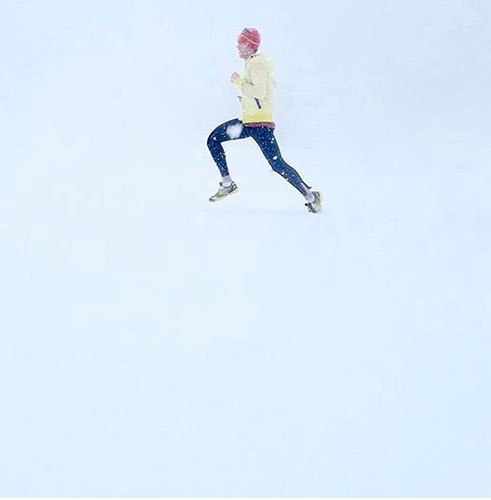man running in winter