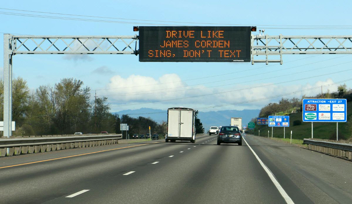 Highway sign referencing James Corden
