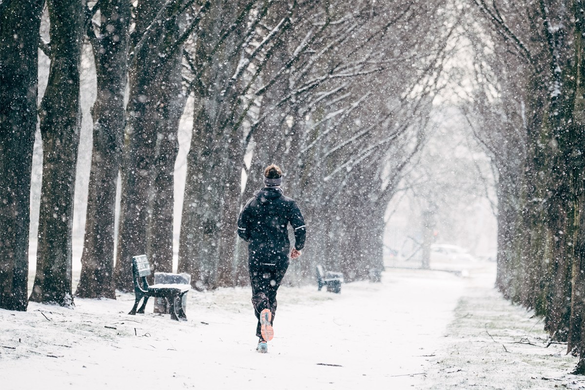 A runner on a wintry trail.