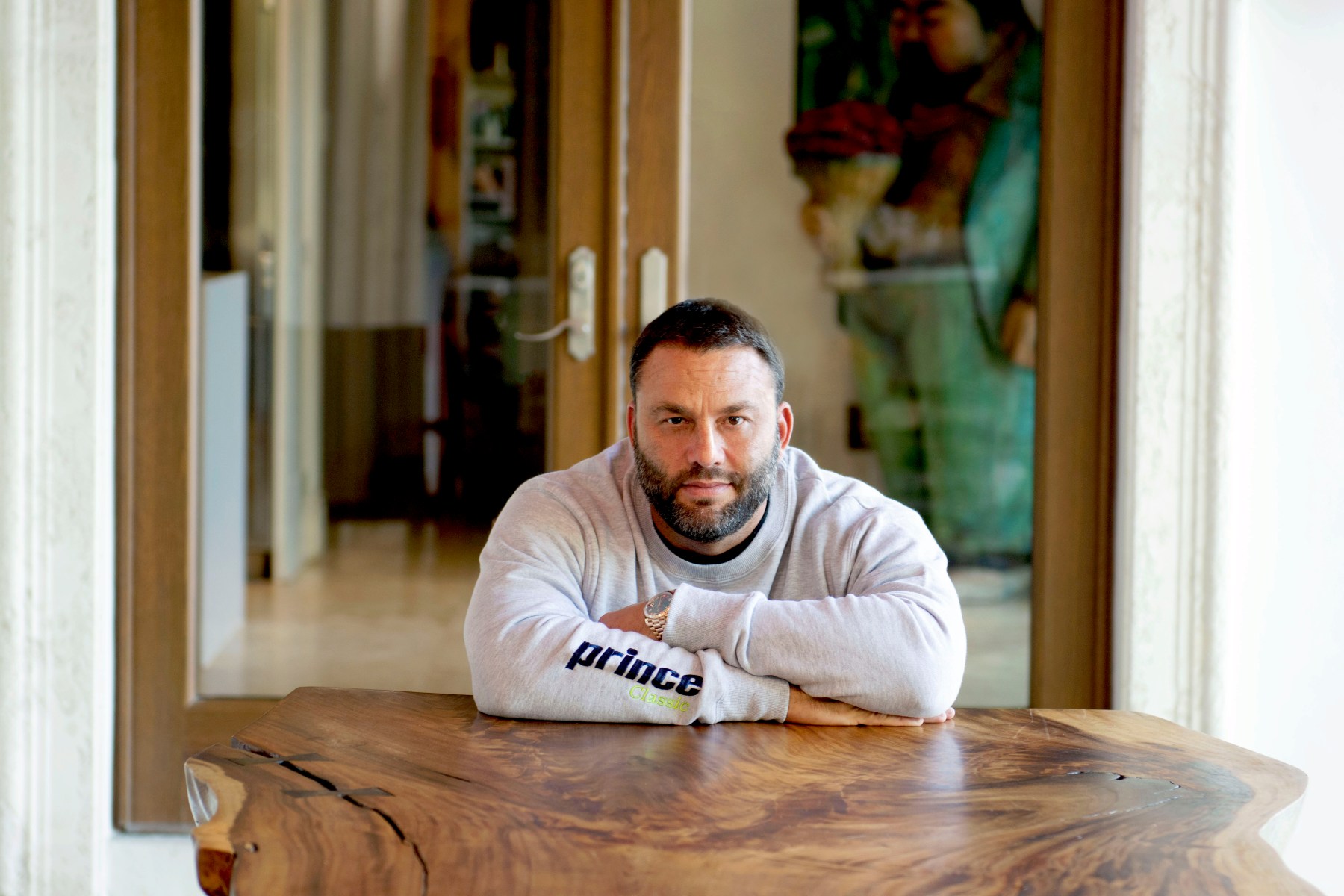 David Grutman outside on back patio. “I love this space,” he says. “I feel at home and I connect better with people, the energy over here.”