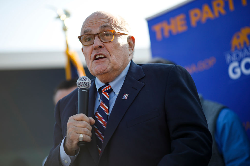 Former New York City Mayor Rudy Giuliani arrives to campaign for Republican Senate hopeful Mike Braun on November 3, 2018 in Franklin Township, Indiana. Photo by Aaron P. Bernstein/Getty Images)