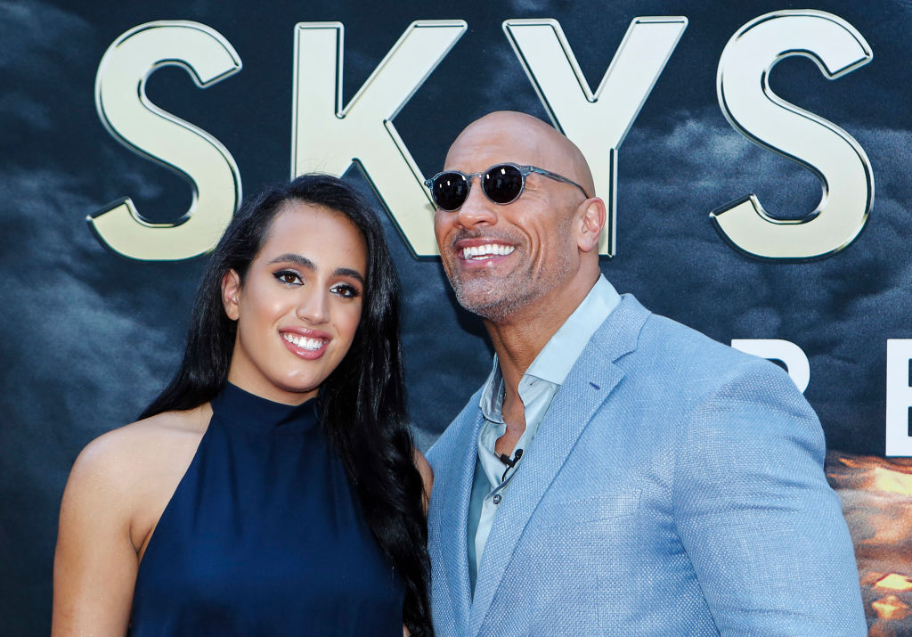 Actor Dwayne Johnson and his daughter Simone Alexandra Johnson attend the premiere of 'Skyscraper' on July 10, 2018 in New York City. (Photo by KENA BETANCUR / AFP)