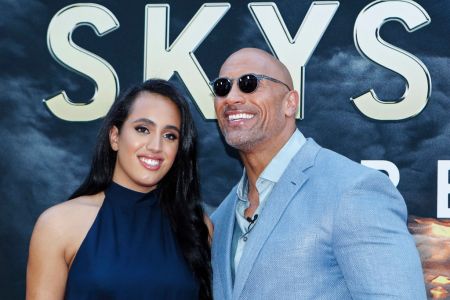Actor Dwayne Johnson and his daughter Simone Alexandra Johnson attend the premiere of 'Skyscraper' on July 10, 2018 in New York City. (Photo by KENA BETANCUR / AFP)