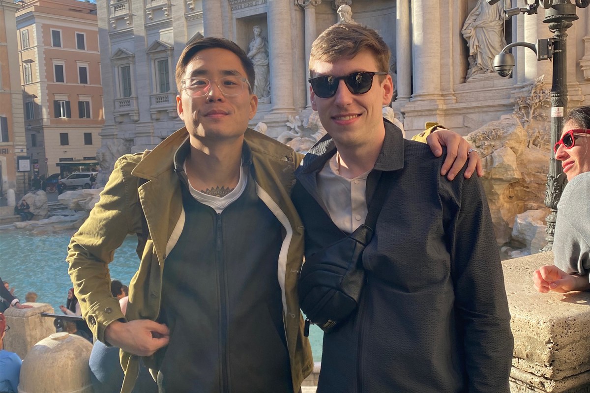 Two American men in front of Rome's Trevi Fountain