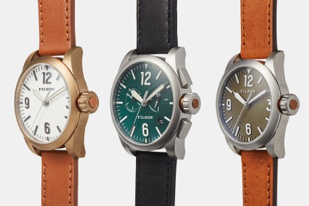 Three quartz watches on leather straps