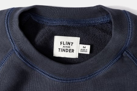 Navy crewneck sweatshirt tag