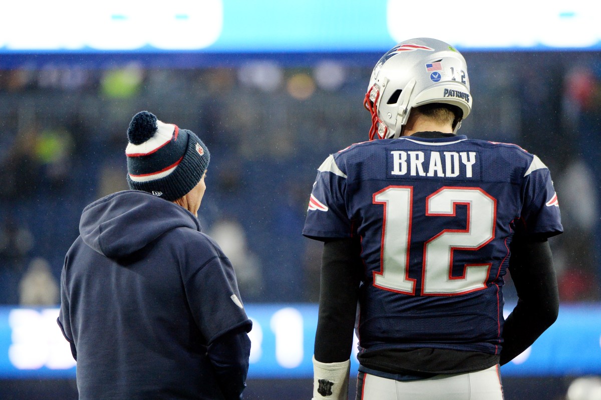 Head coach Bill Belichick of the New England Patriots talks with Tom Brady. (Kathryn Riley/Getty)