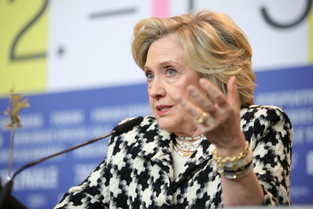 Hillary Clinton speaking in a microphone