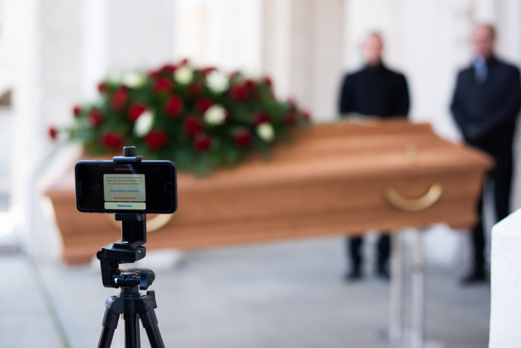 Employees of Bestattung Himmelblau undertakers rehearse the livestreaming of an upcoming funeral on March 24, 2020 in Vienna, Austria. (Photo by Thomas Kronsteiner/Getty Images)