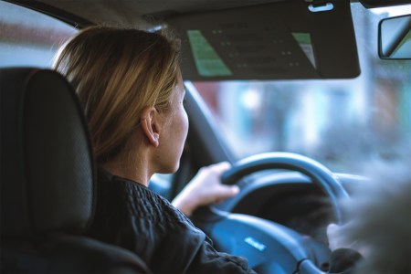 Young woman driving a car