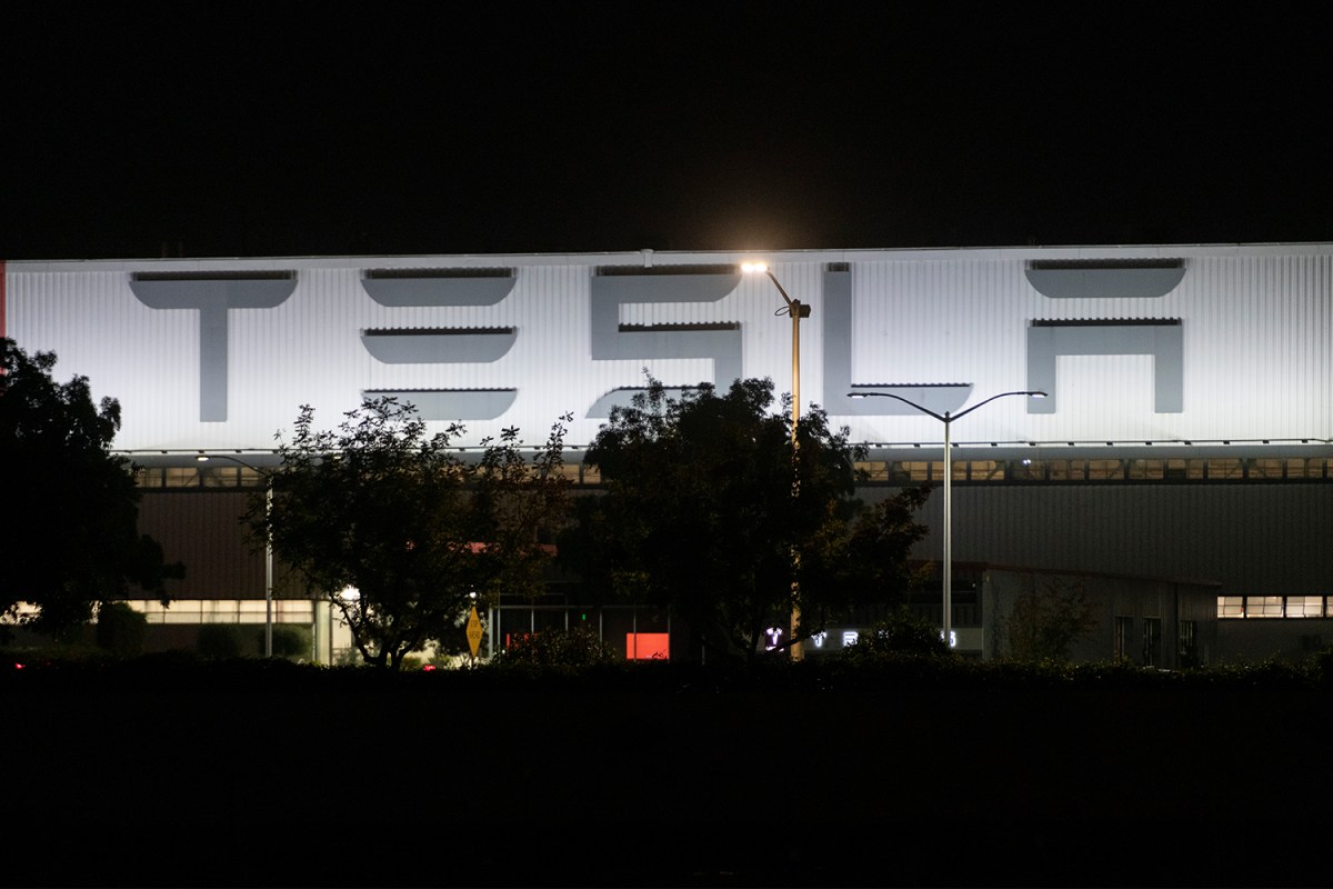 The exterior of Tesla's Fremont factory at night