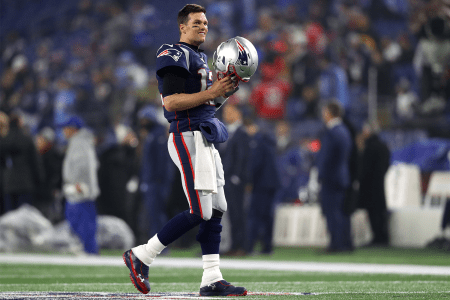Tom Brady walking across the field in AFC Wild Card game