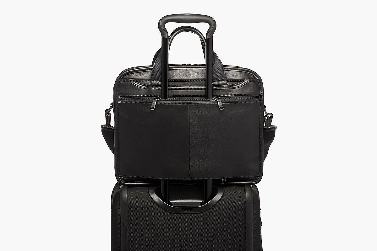 Black wheeled luggage and laptop bag