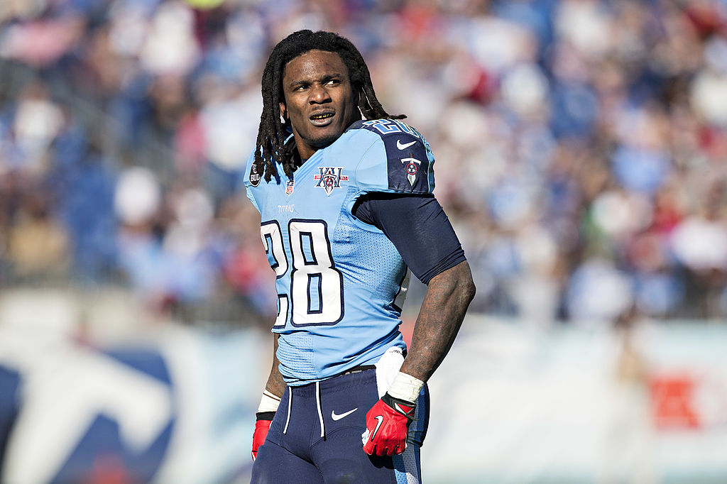 Chris Johnson, formerly of the Tennessee Titans, watches a replay. (Wesley Hitt/Getty)