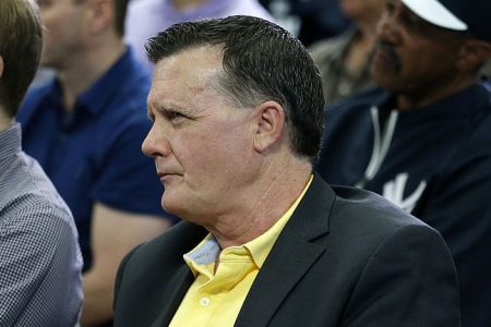 Hank Steinbrenner. watches Derek Jeter speaks at a 2014 media availability. (Mike Carlson/Getty)
