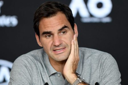 Roger Federer speaks at the 2020 Australian Open. (Morgan Hancock/Getty)