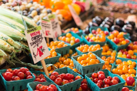 Tomatoes at a farmer's market stand