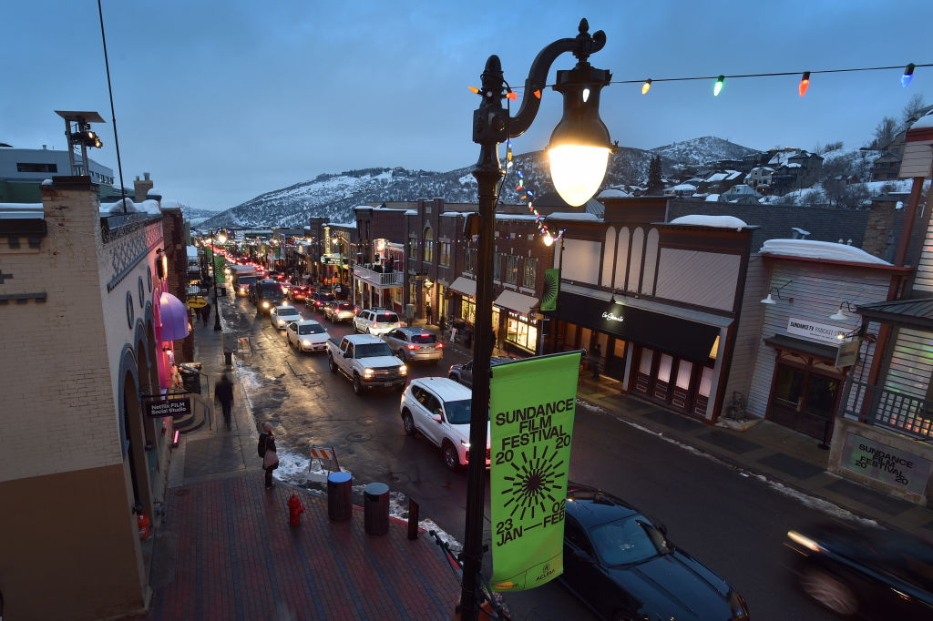 Vehicle traffic and pedestrians negotiate Main Street during the 2020 Sundance Film Festival on January 23, 2020 in Park City, Utah. (Photo by David Becker/Getty Images)