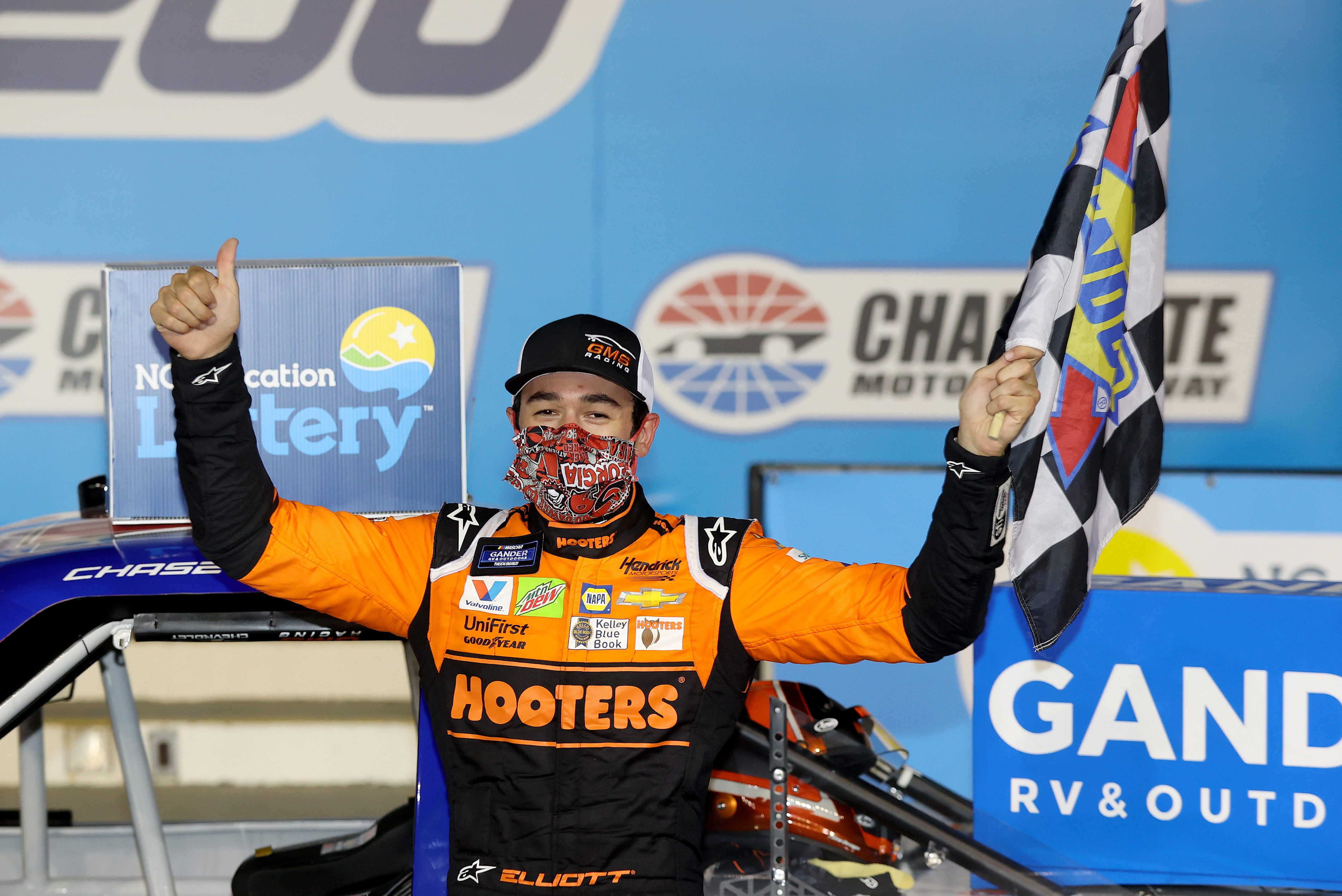Chase Elliott celebrates in Victory Lane after winning the NASCAR Gander Outdoors Trucks Series. (Chris Graythen/Getty)