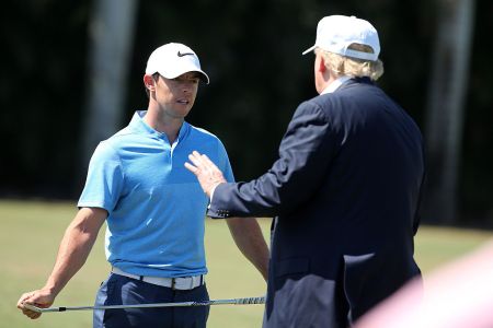 President Donald Trump speaks with golfer Rory McIlroy in 2016