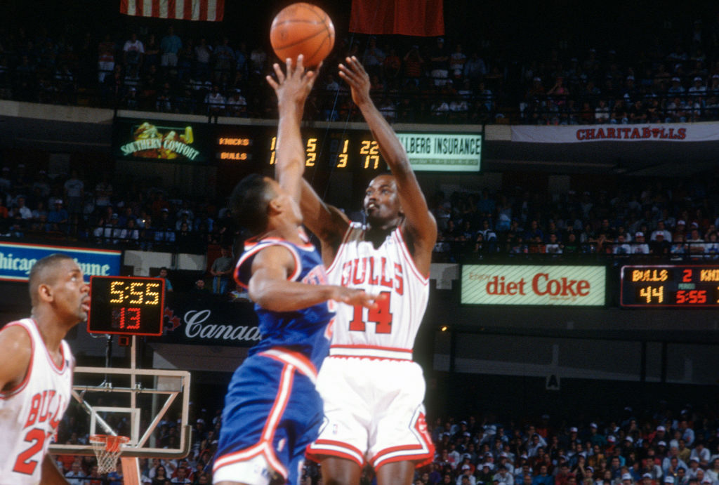 Craig Hodges of the Chicago Bulls shoots against the New York Knicks during an NBA basketball game circa 1992 at Chicago Stadium in Chicago, Illinois. Hodge played for the Bulls from 1988-92. (Photo by Focus on Sport/Getty Images)