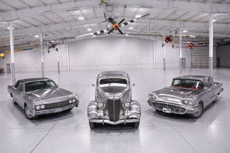 A stainless steel Ford Thunderbird, Ford Deluxe Sedan and Lincoln Continental Convertible