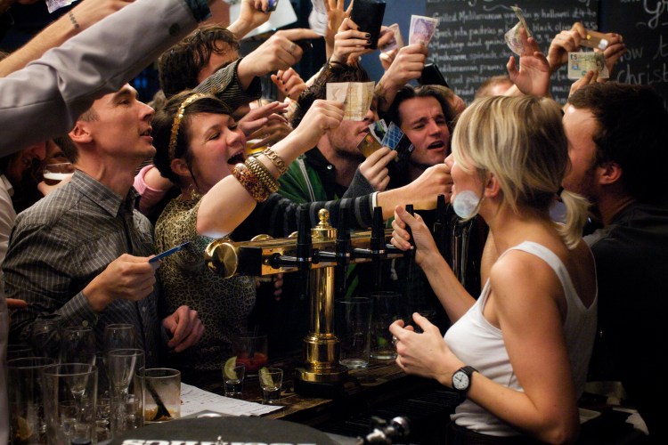 drinking in a crowded bar