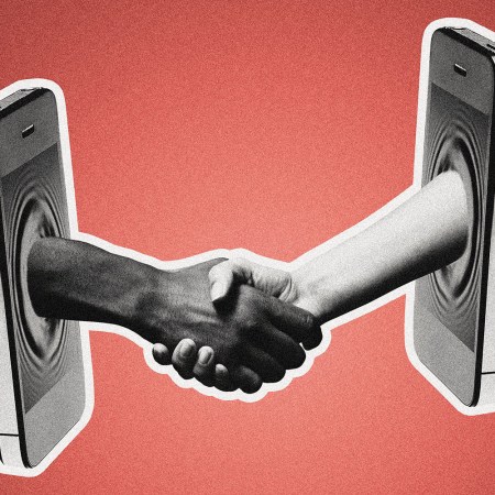 Two hands shake through phone screens