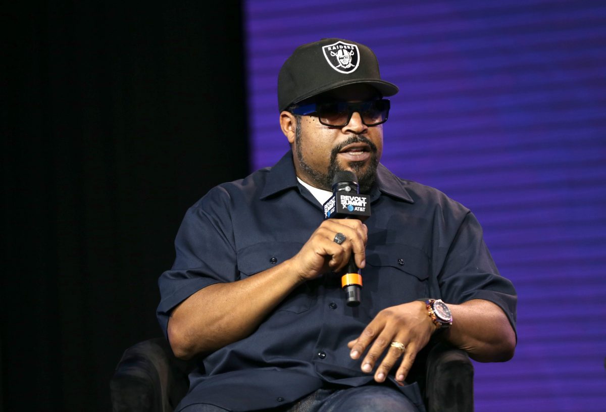 Rapper and actor Ice Cube talking on a microphone
