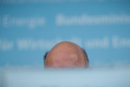 The bald head of German Economy Minister Peter Altmaier is pictured as he holds a press conference about the new amendment of the Foreign Trade and Payments Act and the overall economic development, in Berlin, on April 8, 2020, in the context of the novel coronavirus COVID-19 pandemic. (Photo by MICHAEL KAPPELER/POOL/AFP via Getty Images)