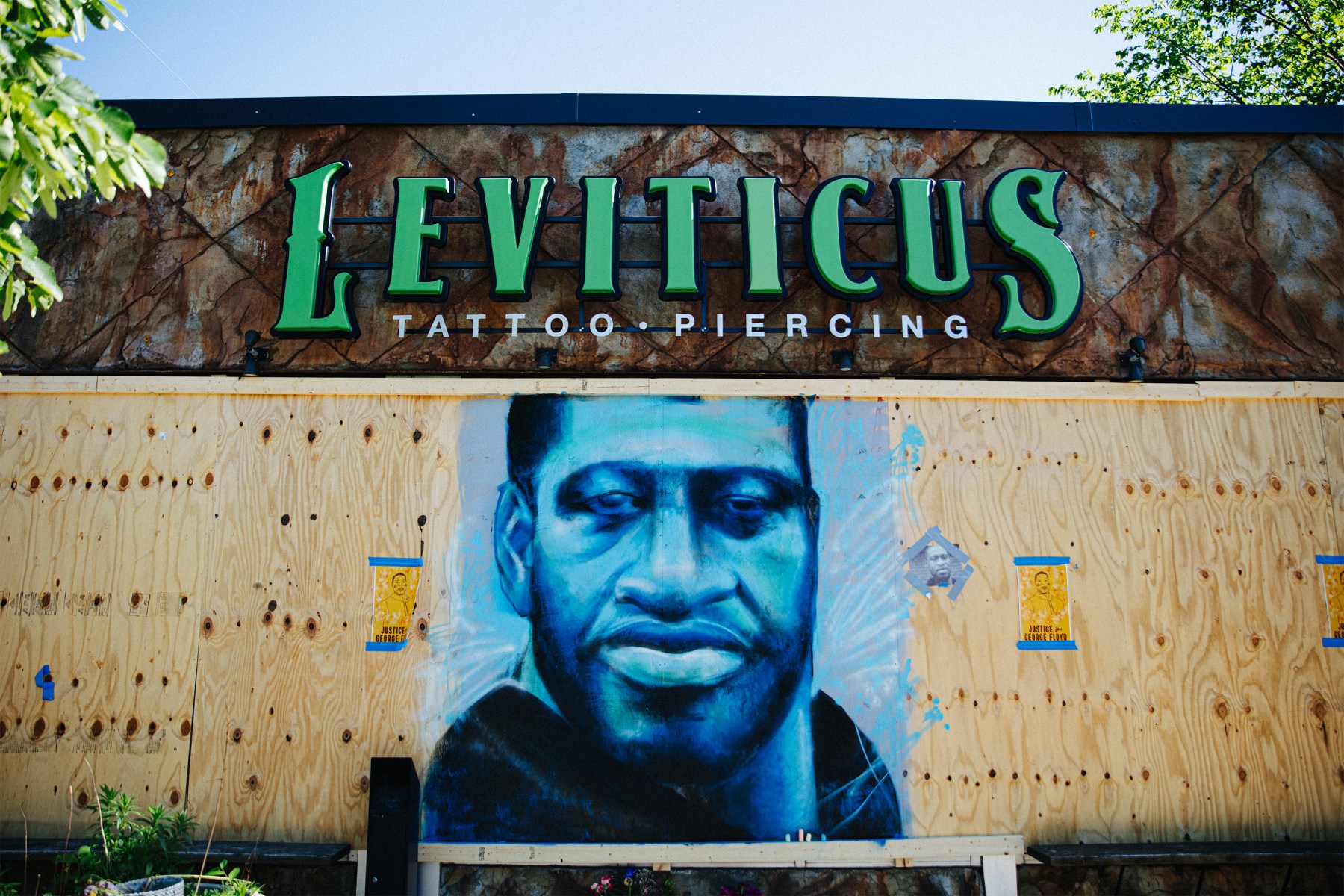 Multiple tattoo artists in the city have used their skills to honor George Floyd and others.