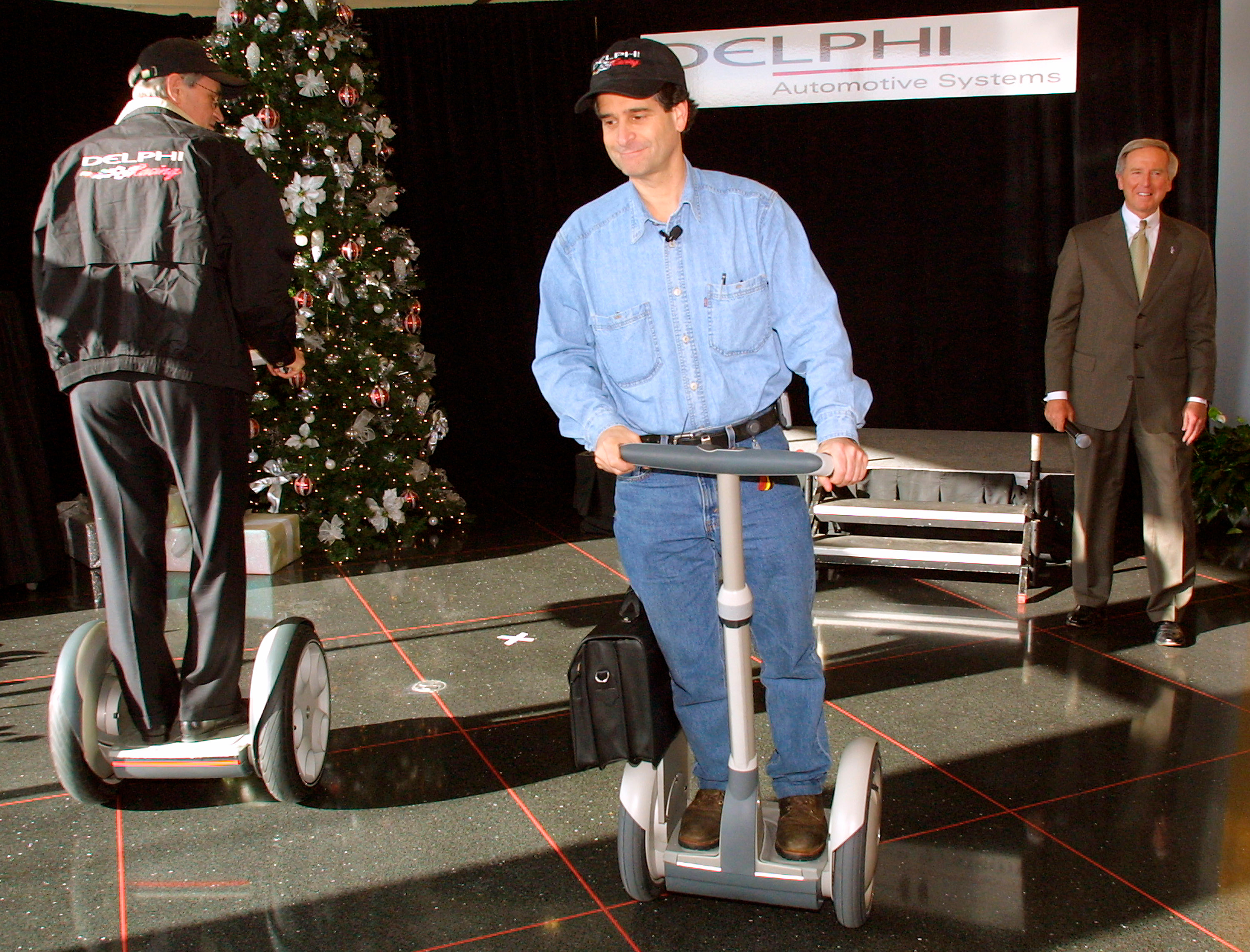 Segway inventor Dean Kamen demonstrates the futuristic scooter in December 2001