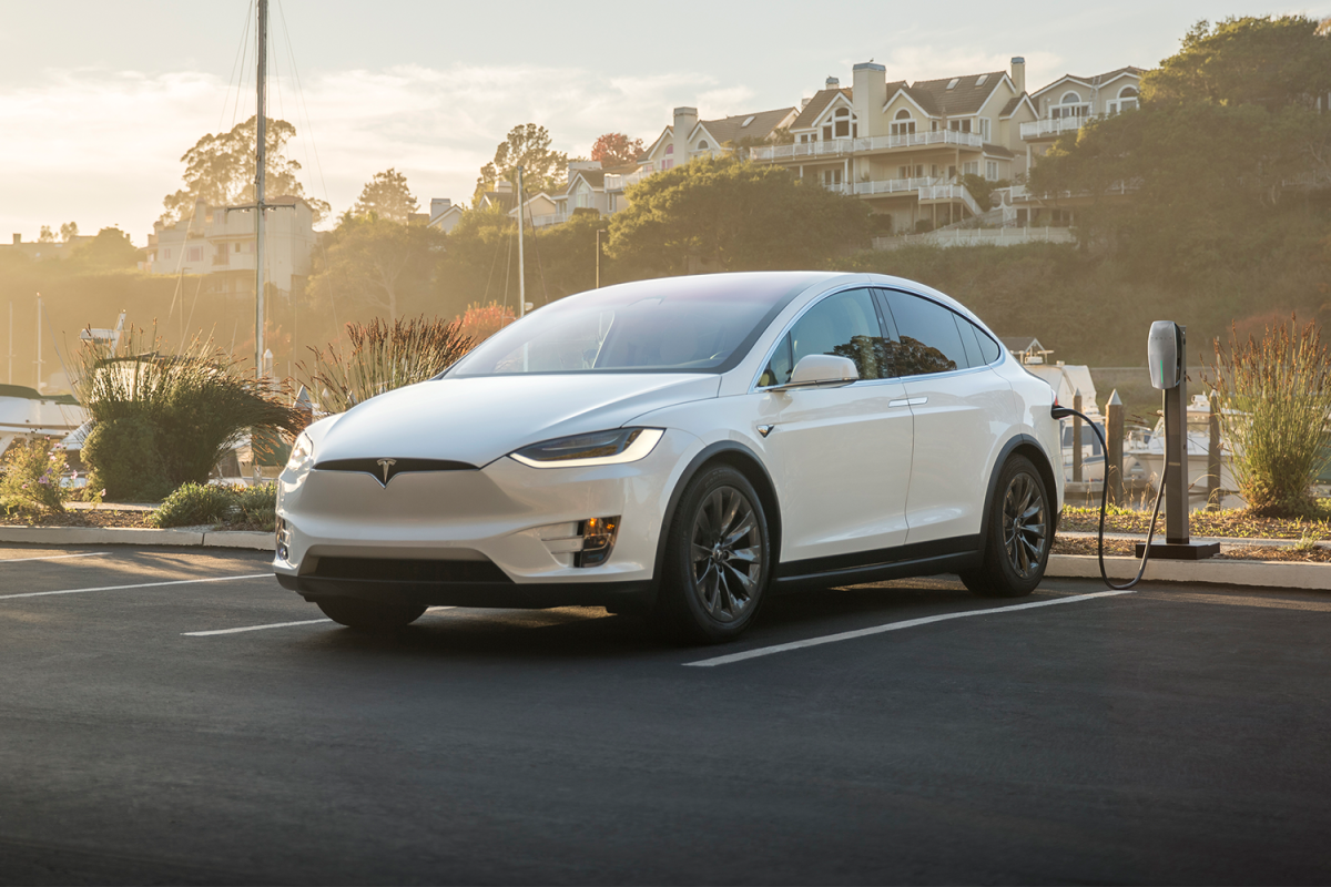 Tesla electric vehicle at a destination charging station