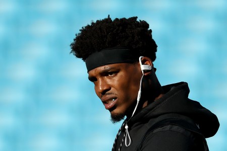 Cam Newton warms up for a game against the New England Patriots.  (Streeter Lecka/Getty)