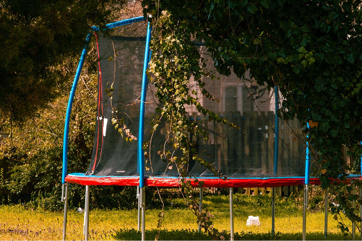 Trampoline in a backyard