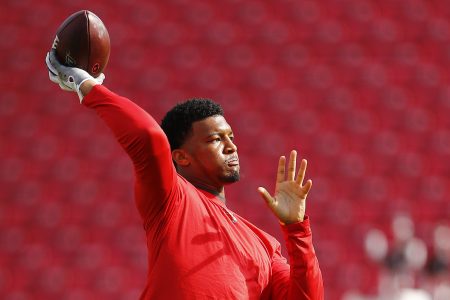 NFL quarterback Jameis Winston throwing the football