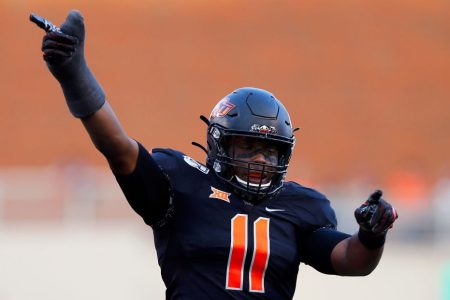 Linebacker Amen Ogbongbemiga of the Oklahoma State Cowboys
