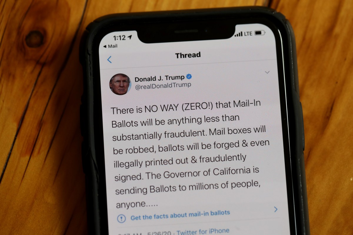 A tweet from Donald Trump on a smartphone
