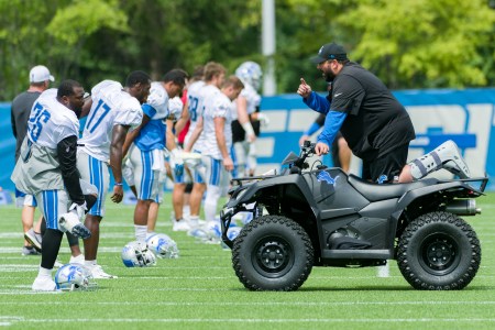 Detroit Lions head coach Matt Patricia talks to players during training camp.