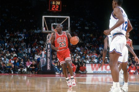 Michael Jordan of the Chicago Bulls dribbles against the Washington Bullets.