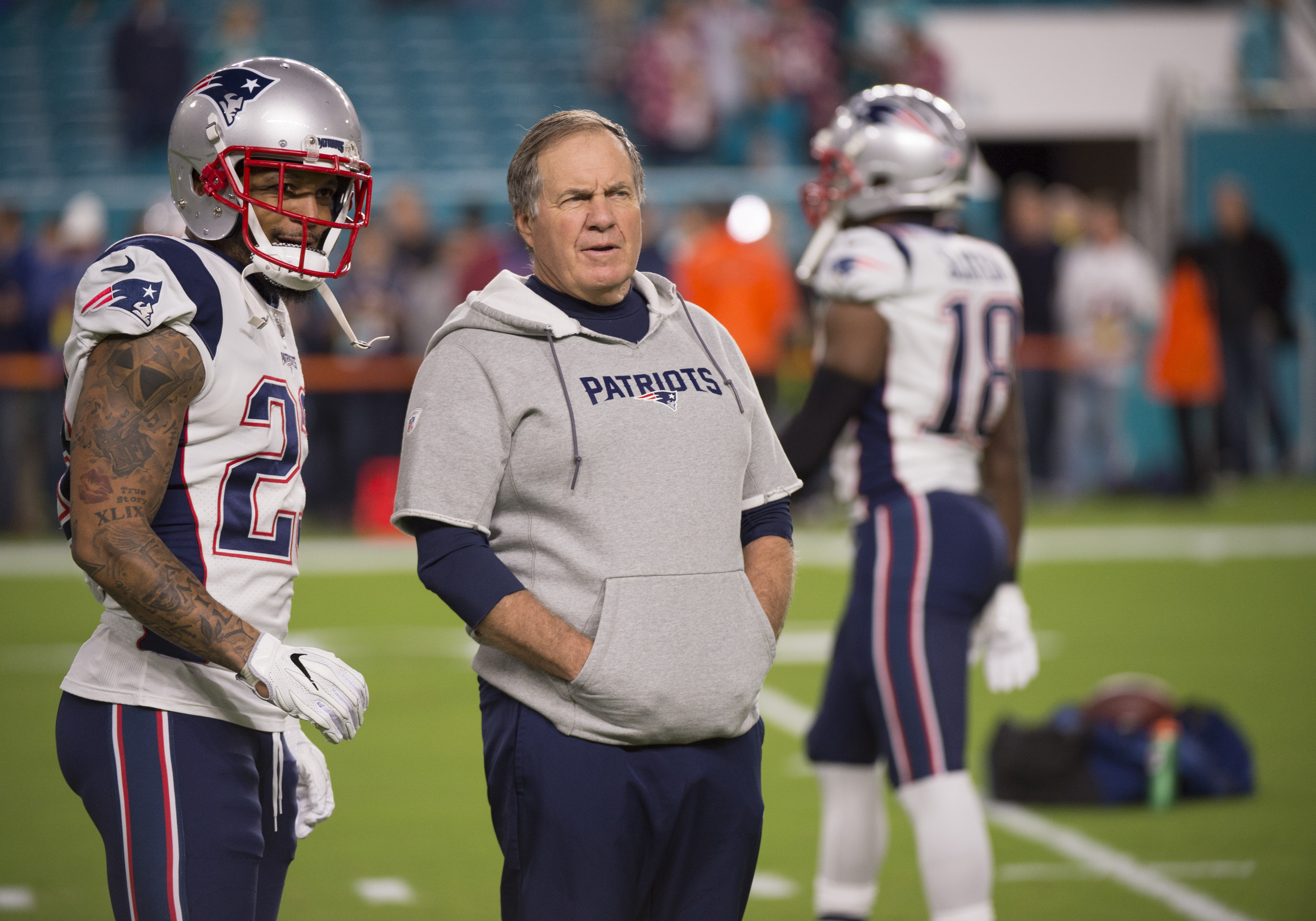 New England head coach Bill Belichick and Patriots safety Patrick Chung talk on the field in 2017. (Doug Murray/Icon Sportswire via Getty)
