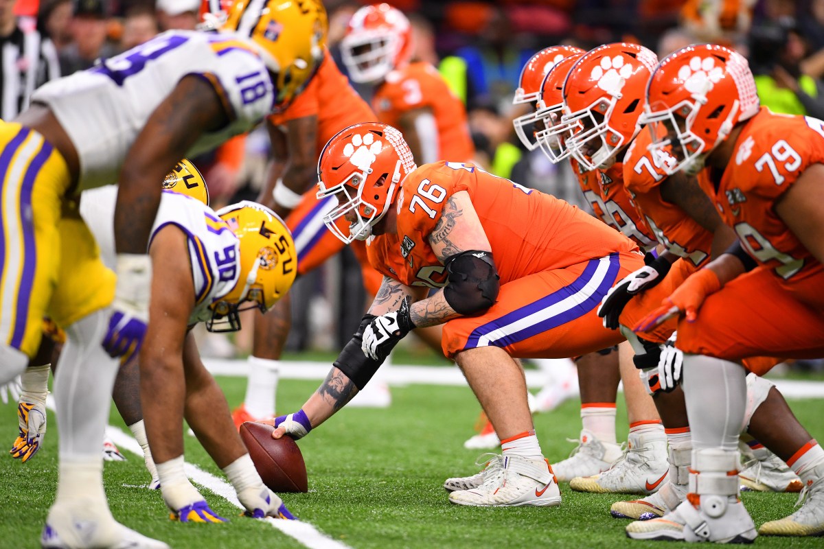 The Clemson Tigers prepare to snap the ball against the LSU Tigers. (Jamie Schwaberow/Getty)