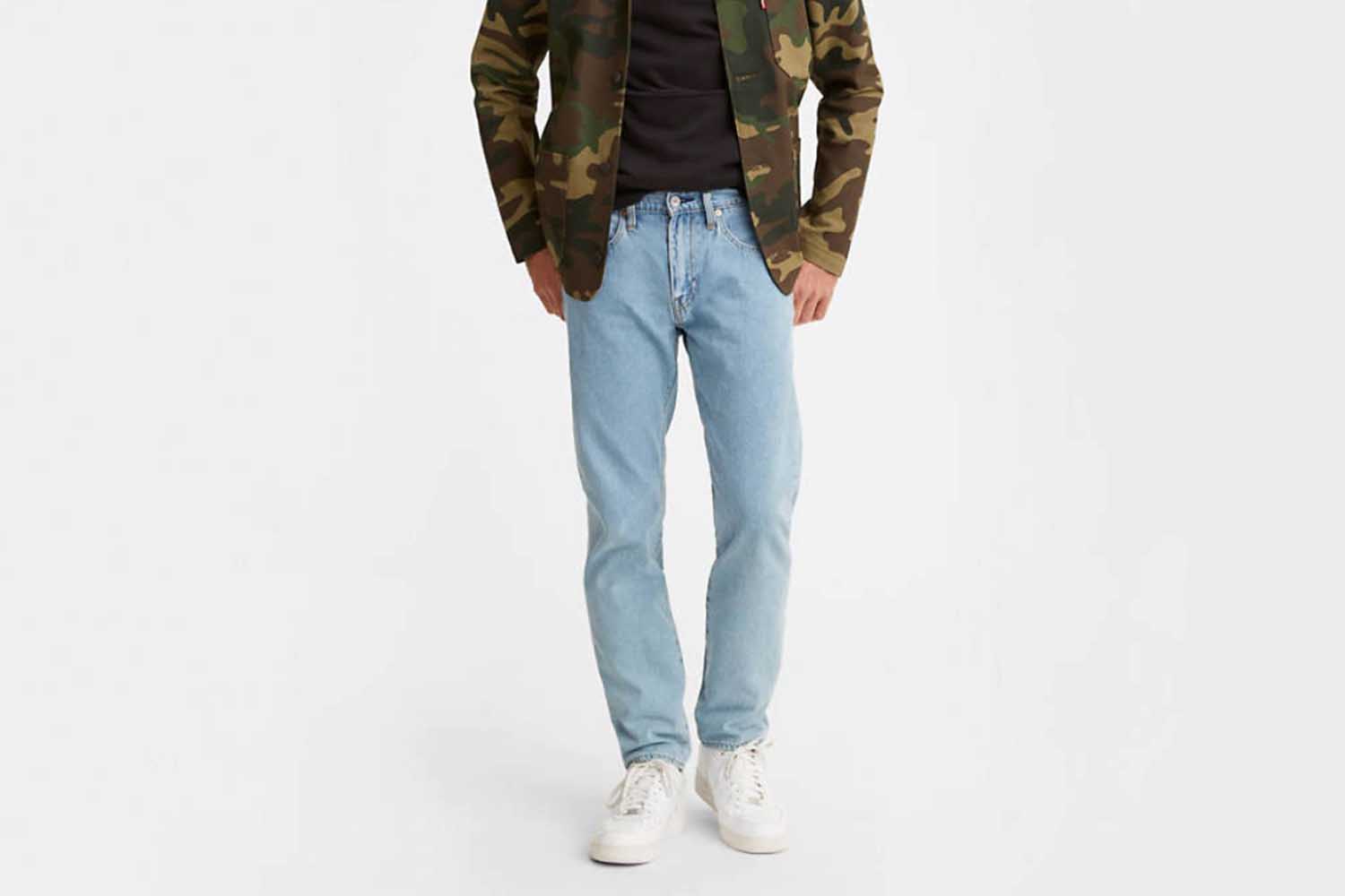 Man wearing a pair of Levi's 502 Taper Fit jeans