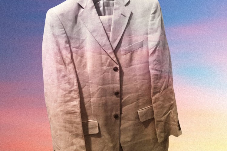 A linen suit is a popular choice for summer events.